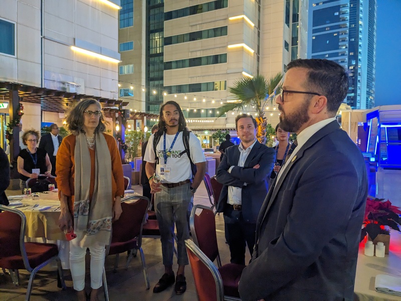 Attendees at a reception held by the Lincoln Institute at COP28 in Dubai.