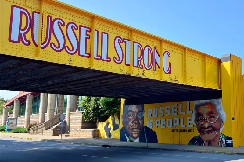 Yellow bridge with 'Russell Strong' slogan